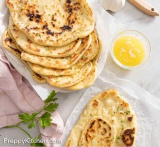 Pinterest graphic of multiple naan bread stacked on a platter beside one off to the side.