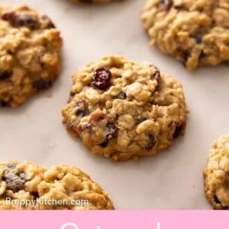 Pinterest graphic of oatmeal cranberry cookies in a single layer.