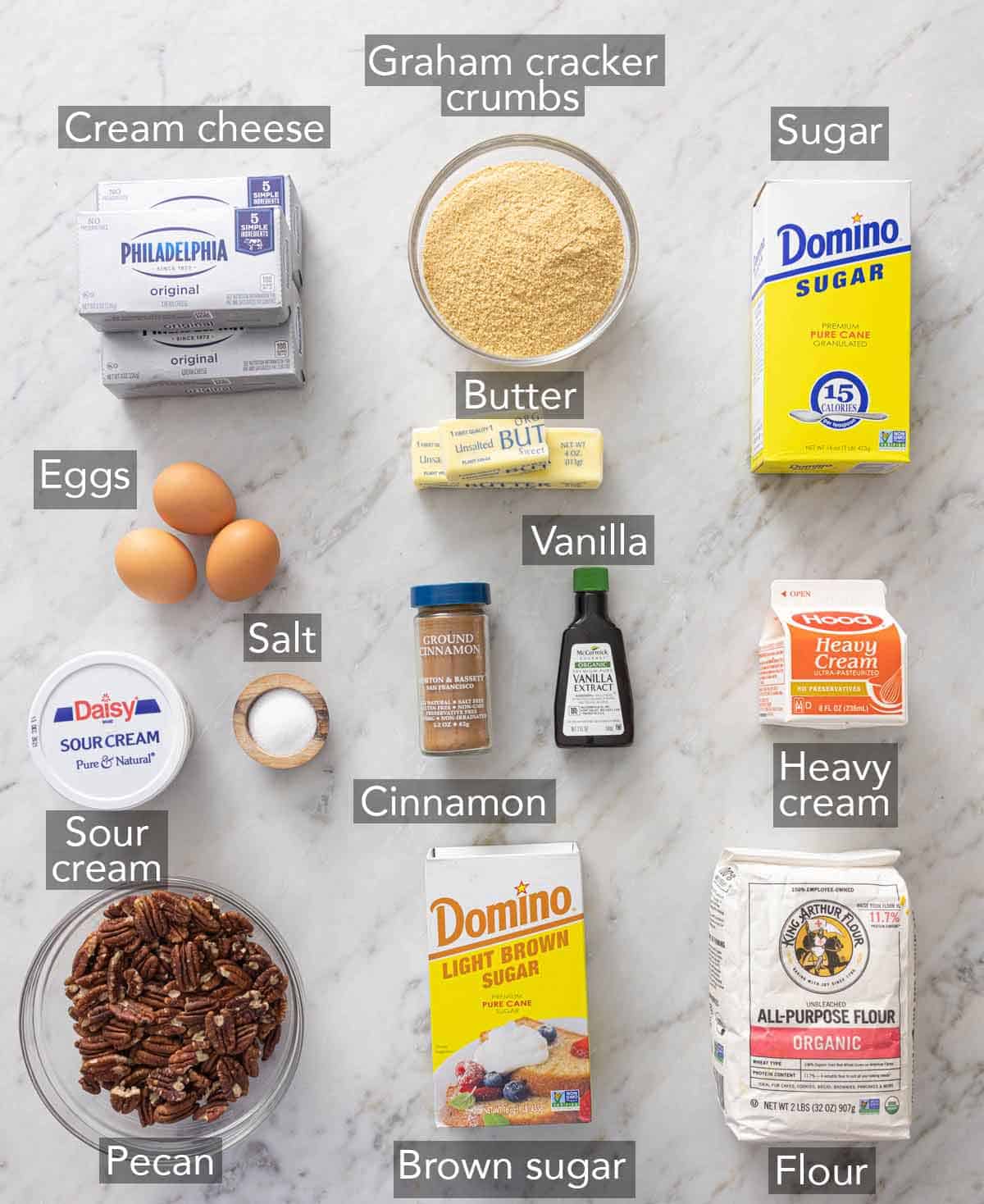 Ingredients needed to make pecan pie cheesecake.