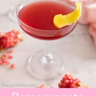 Pinterest graphic of a glass of pomegranate martini with lemon peel.