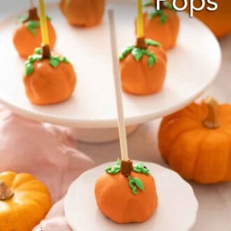 Pinterest graphic of pumpkin cake pops on a cake stand and one in front.