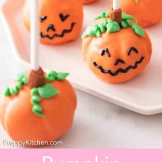 Pinterest graphic of smiling pumpkin cake pops on a plate and one without a face in front.