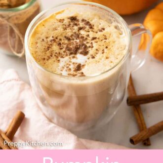 Pinterest graphic of a latte with pumpkin pie spice sprinkled over top with a jar of it in the background.