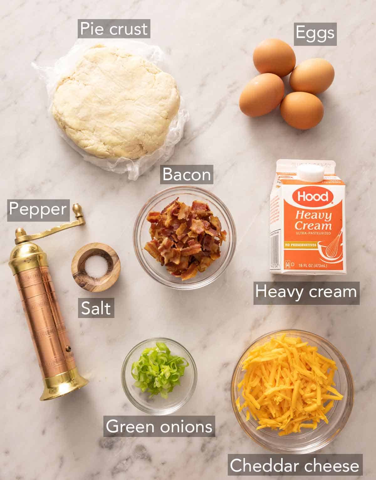 Ingredients needed to make a quiche.