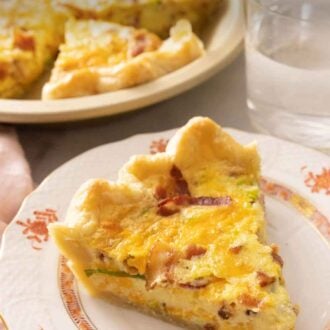 Pinterest graphic of a slice of quiche on a plate in front of the rest in a pie dish.