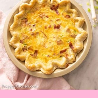 Pinterest graphic of the overhead view of a quiche in a pie dish.