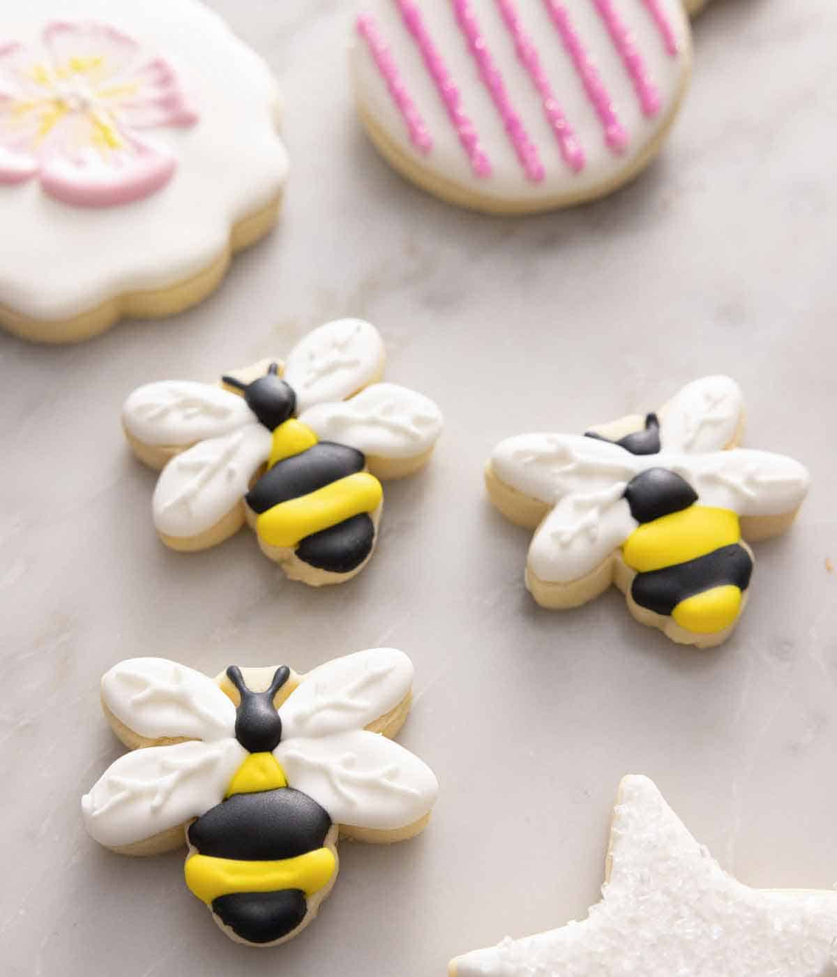 Bumblebee cookies decorated with royal icing.