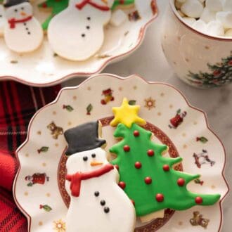 Pinterest graphic of a plate of Christmas cookies.
