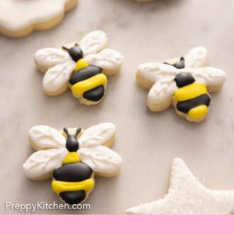 Pinterest graphic of bumblebee cookies with royal icing.