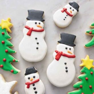 Christmas themed sugar cookies decorated with royal icing.