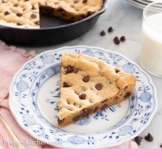 Pinterest graphic of a plate with a slice of skillet cookie.
