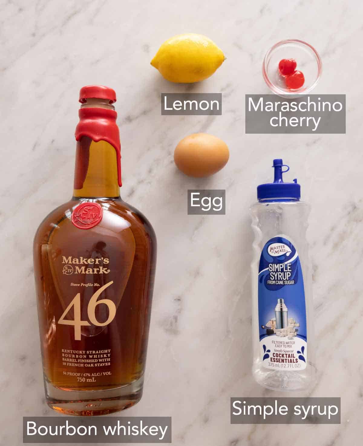 Ingredients needed to make a whiskey sour.