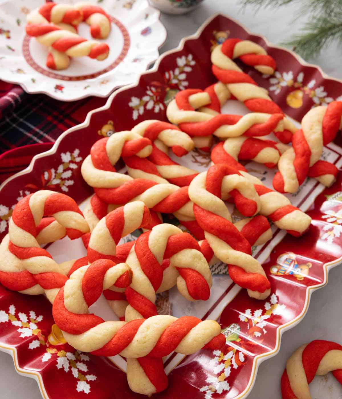 A platter of multiple candy cane cookies.