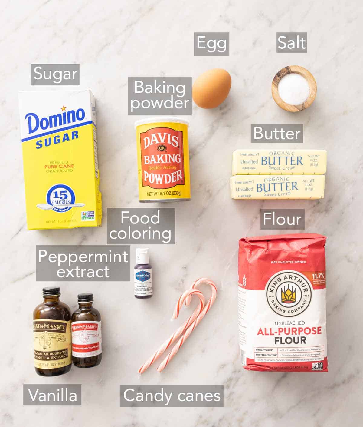 Ingredients needed to make candy cane cookies.