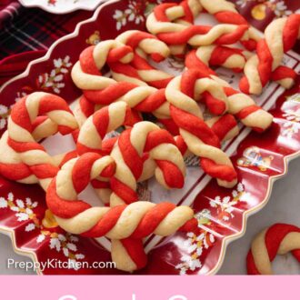 Pinterest graphic of a platter of candy cane cookies.