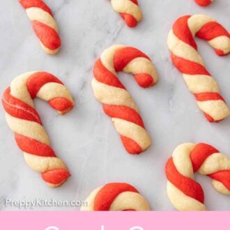 Pinterest graphic of multiple candy cane cookies.