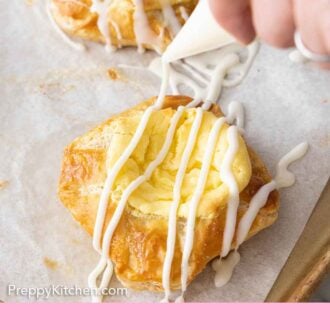 Pinterest graphic of a glaze drizzled over a cheese danish.