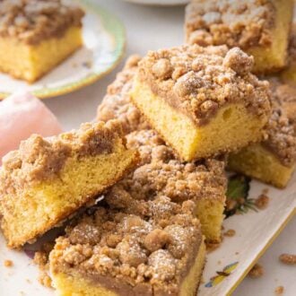 Pinterest graphic of a platter of crumb cake slices.