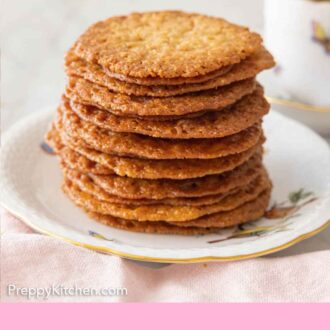 Pinterest graphic of a plate with a stack of lace cookies.
