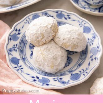 Pinterest graphic of three Mexican wedding cookies on a plate.