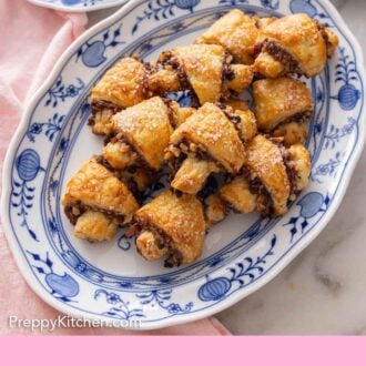Pinterest graphic of a platter a pile of rugelach.