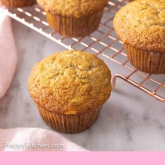 Pinterest graphic of a banana muffin in front of a wire rack with more.