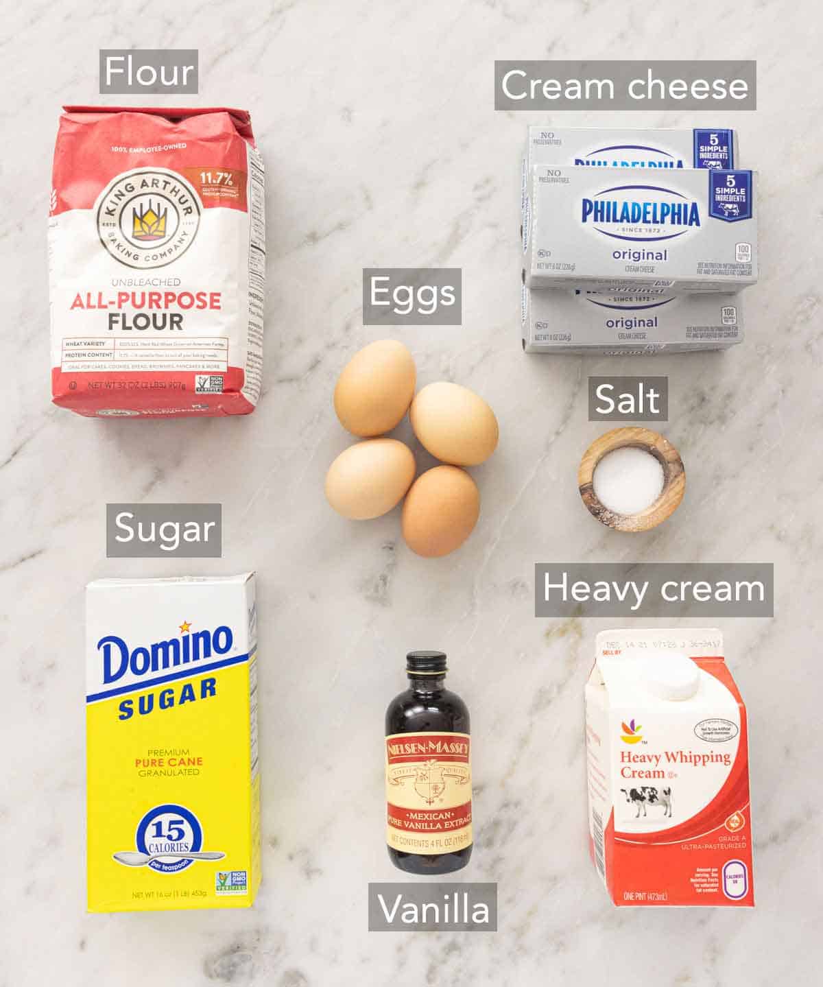 Ingredients needed to make a basque cheesecake.