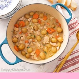 Pinterest graphic of a Dutch oven of a chicken stew by some sliced bread.