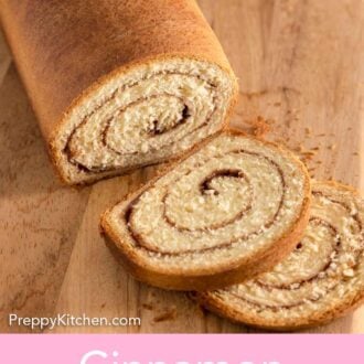 Pinterest graphic of a loaf of cinnamon swirl bread with two slices cut.