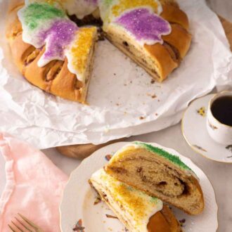 Pinterest graphic of a king cake with two slices cut and serving in front.