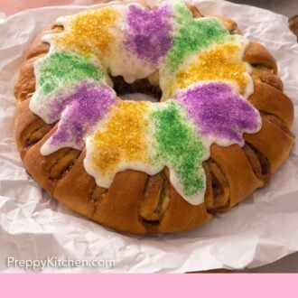 Pinterest graphic of a king cake with purple, green, and yellow sanding sugar.