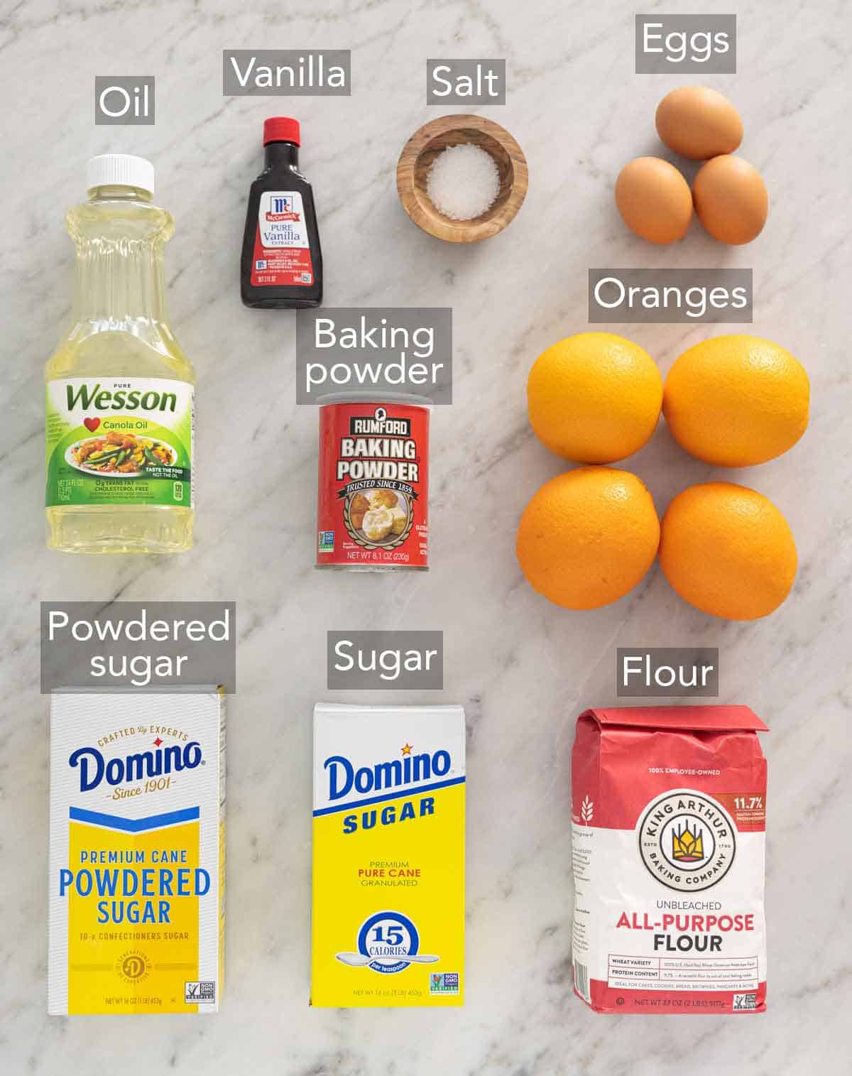 Ingredients needed to make an orange cake.