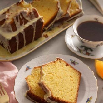 Pinterest graphic of two slices of orange cake on a plate in front of the rest of the loaf.