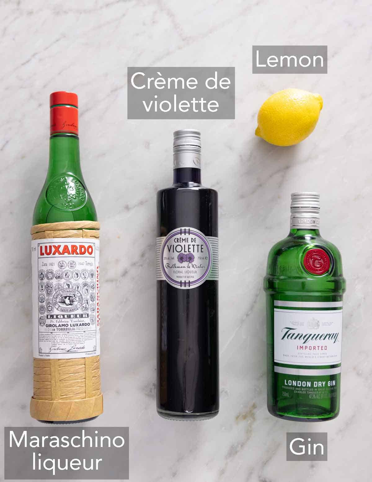 Ingredients needed to make an Aviation cocktail.