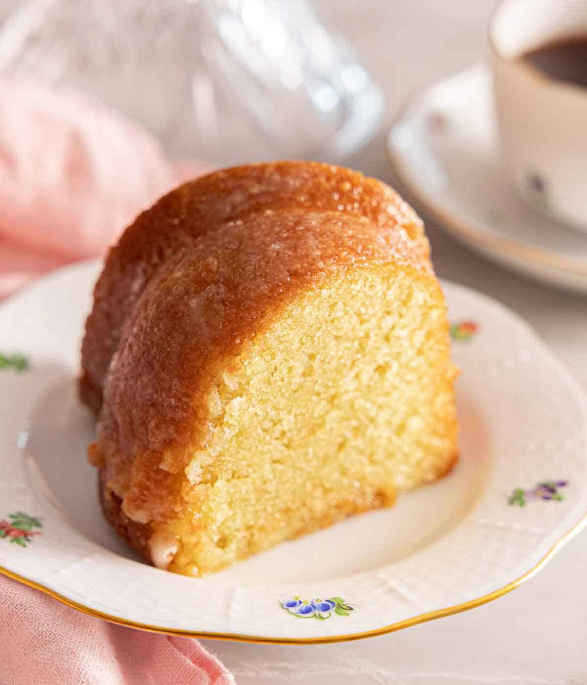 Close up view of a plate with a slice of butter cake.