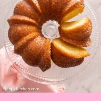 Pinterest graphic of an overhead view of a butter cake with two slices cut.