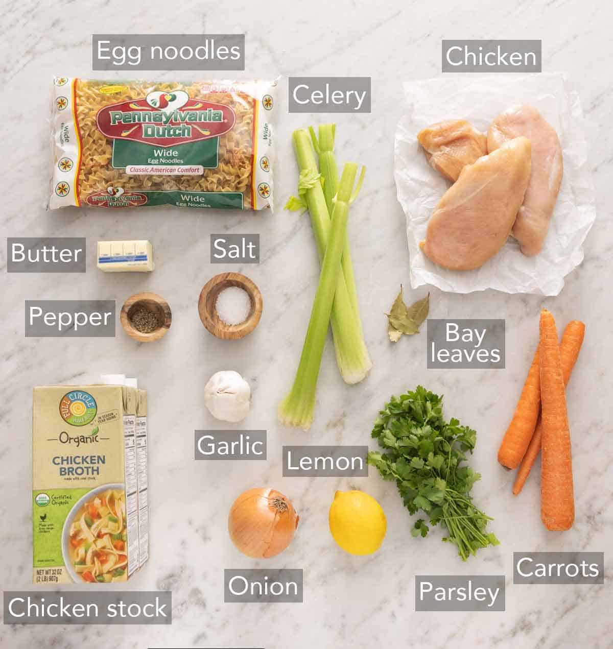 Ingredients needed to make chicken noodle soup.
