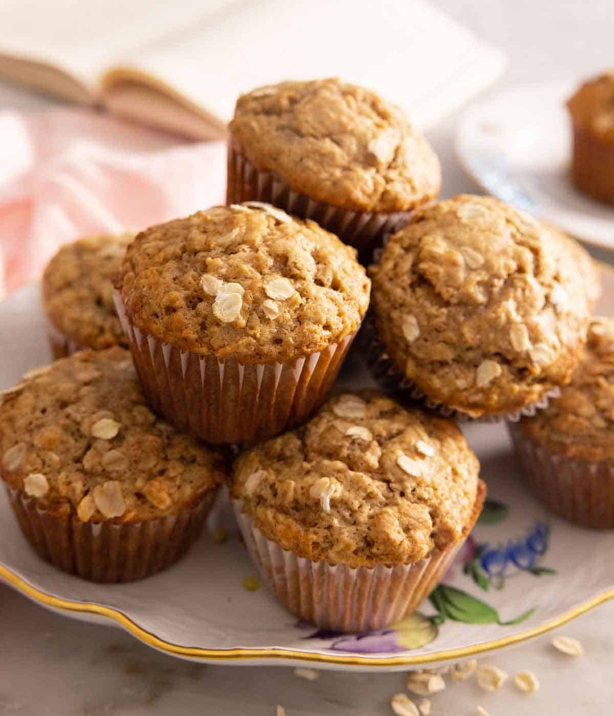 A platter of a pile of oatmeal muffins.