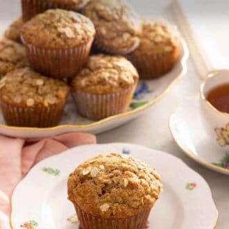 Pinterest graphic of a plate with a oatmeal muffin with a platter in the background.