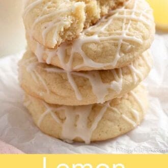 Pinterest graphic of four lemon cookies stacked on top of each other.