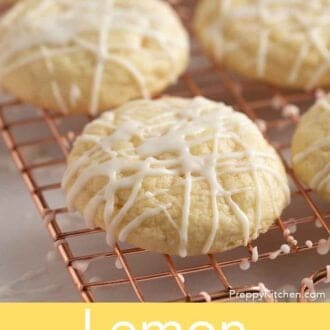Pinterest graphic of glazed lemon cookies on a wire rack.