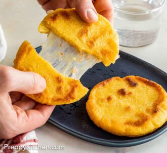 Pinterest graphic of an arepa pulled apart, in half.