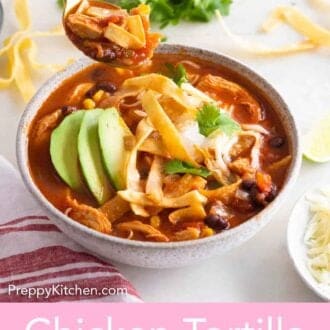 Pinterest graphic of a spoonful of chicken tortilla soup lifted from a bowl of soup.