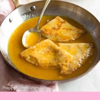 Pinterest graphic of a skillet with three crepe suzette.