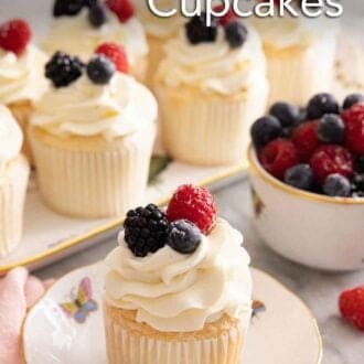 Pinterest graphic of an angel food cupcake on a plate in front of a platter of them.