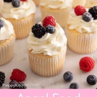 Pinterest graphic of multiple angel food cupcakes with fresh berries on top.