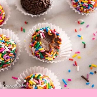 Pinterest graphic of multiple brigadeiros with one with a bite taken out.