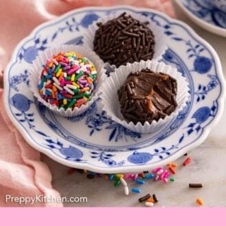Pinterest graphic of three brigadeiros on a plate with one with a bite taken out.