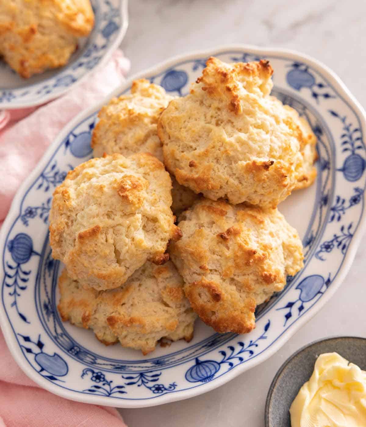 A platter of multiple drop biscuits.