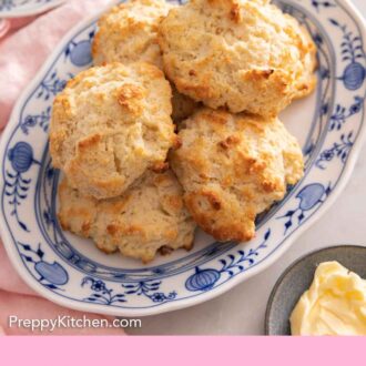 Pinterest graphic of a platter of drop biscuits.
